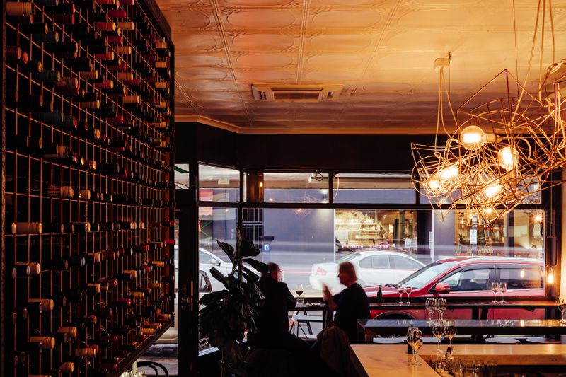 Round out a day of culinary adventures with a drink at cosy North Hobart neighbourhood wine bar, Willing Bros. Wine Merchants. Credit: Adam Gibson