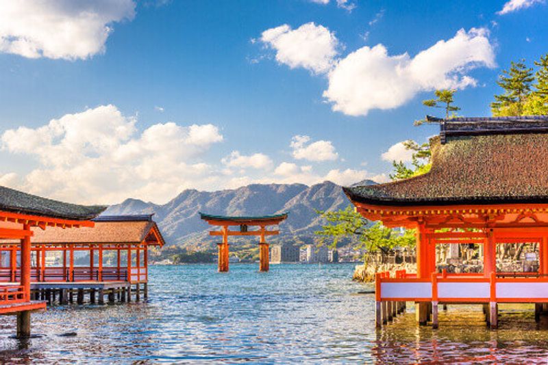 Overlooking the floating Torii gate or floating shrine in Miyajima, Hiroshima, Japan.