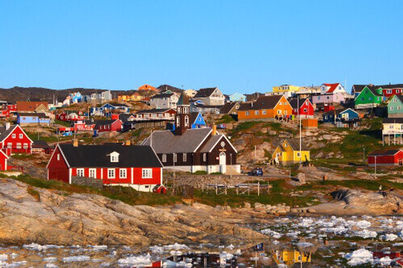 Ilulissat is the biggest island in the world, with Zion Church in the background.