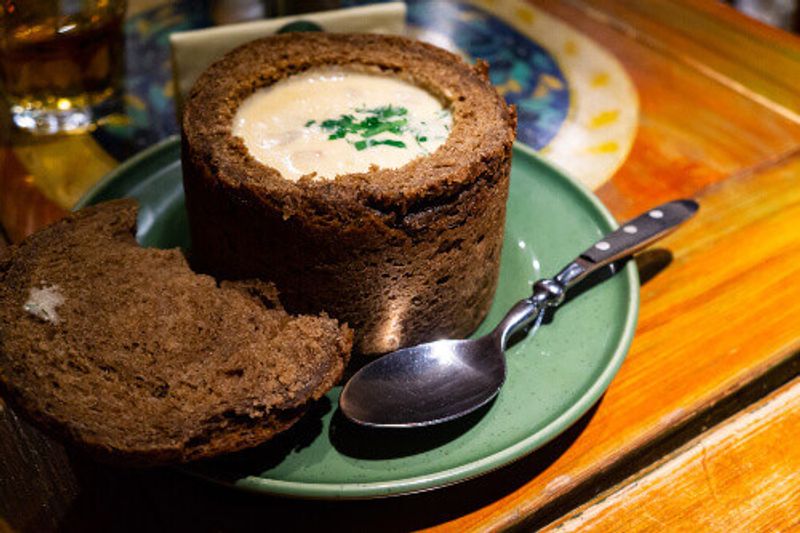 Thick cheese soup in a piece of rye bread is an Estonian staple.