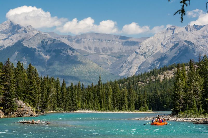 Tourists can enjoy rafting on the Bow River in Banff National Park during the summer.