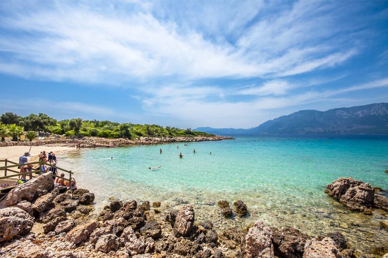 Tourists swimming at the Cleopatra Beach in Sedir Island, Marmaris.