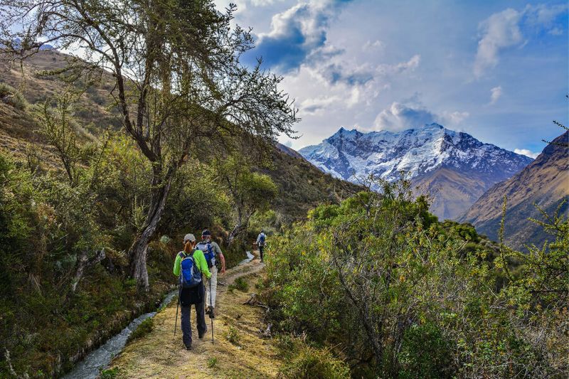 Hikers going up the trail to the Salkantay Mountains.