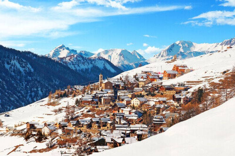 The village and beautiful mountain slopes of Saint-Véran in a snowy winter.