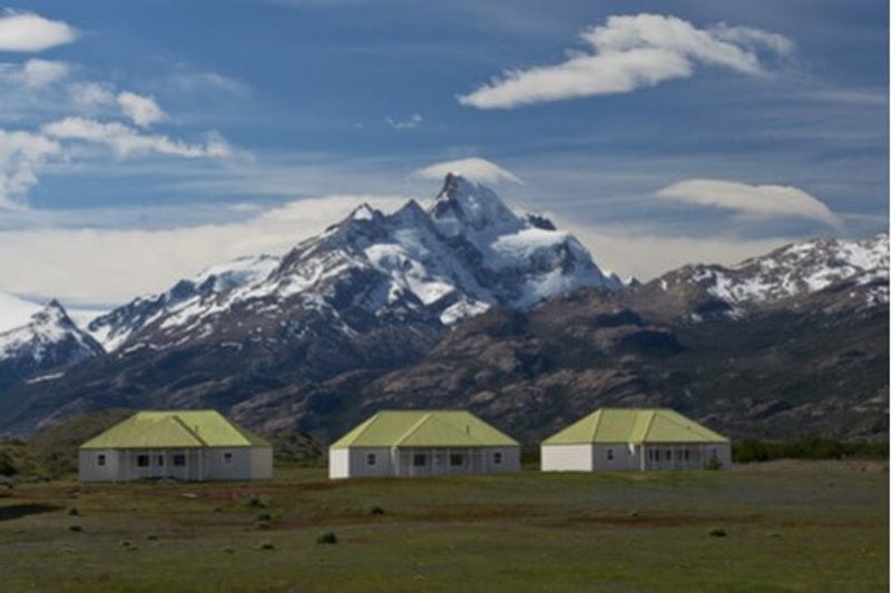 Estancia in Patagonia against the backdrop of mountains.