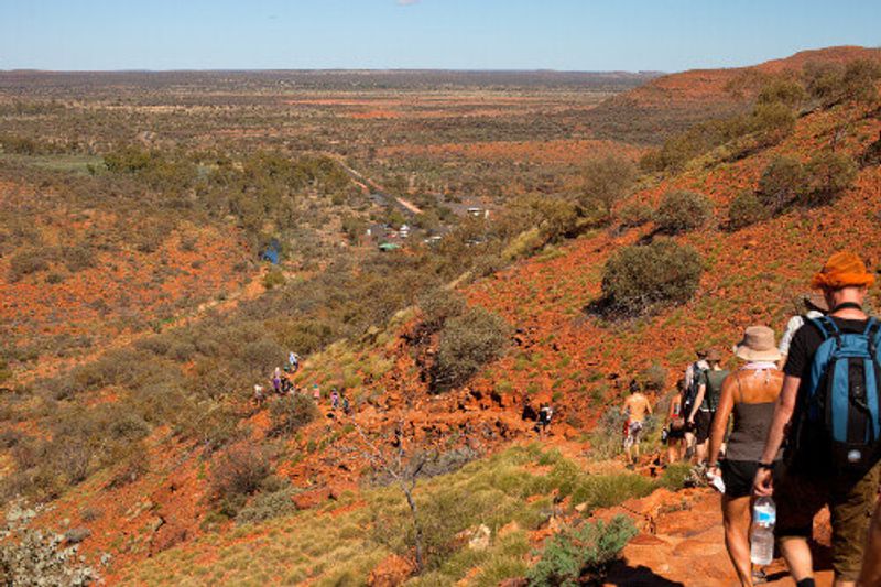 Tourists walking down the path with their guide in Kings Canyon.