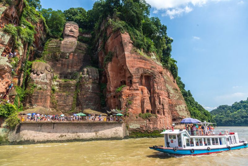 The Buddha sits at the junction of the Min, Qingyi and Dadu rivers.