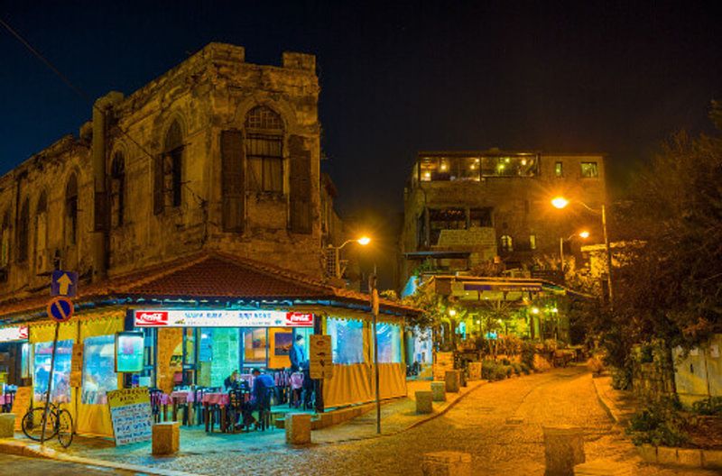 In the evening, the cafe in the Old Jaffa shines brightly.