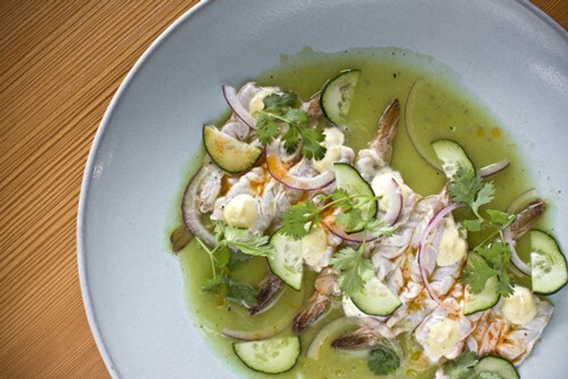 A tasty aguachile shrimp ceviche on a plate.