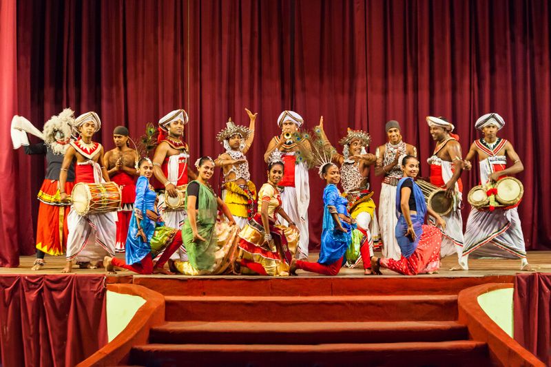 Unidentified artists posing at the cultural Kandyan Dance Show.