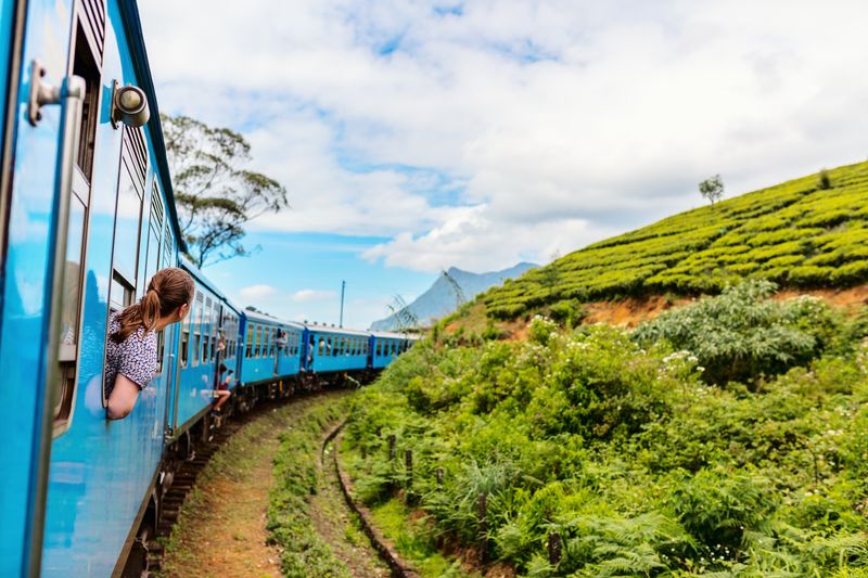 Rolling green hills, lush tea plantations and stunning mountain views: this rail journey is postcard-perfect.