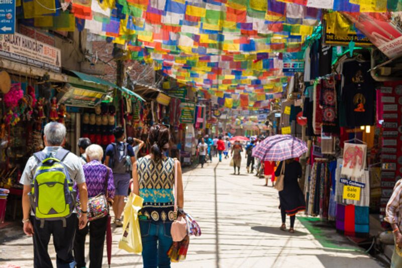 Tharmel shopping street is often bustling as locals and tourists browse the stores.