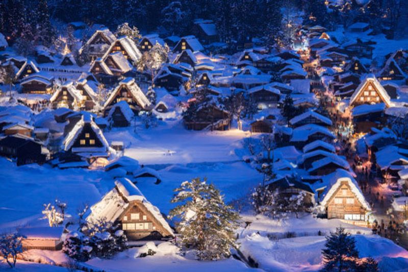 The snowy huts of Shirakawago in winter.