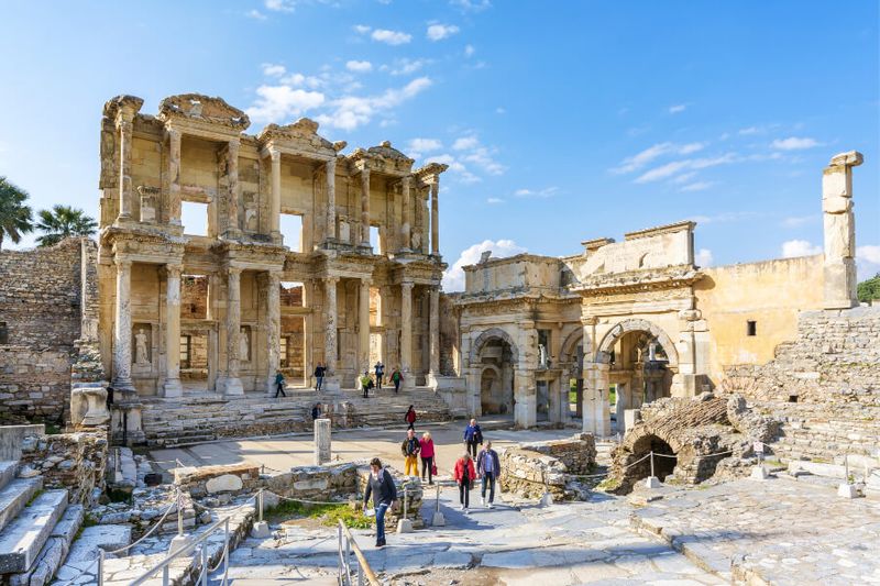 Tourists visiting the Library of Celsus in Ephesus