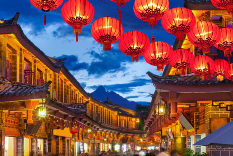 Red lanterns light up the streets of Lijiang.