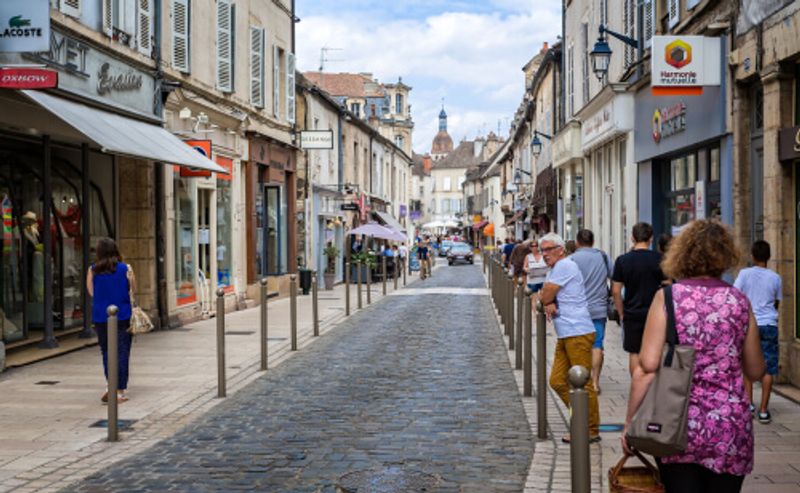 A local street in Beaune gives visitors a taste of the quaintness of Europe.