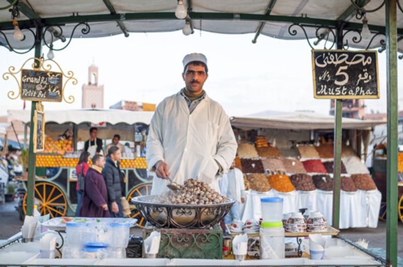 A local Ghoulal seller shows his wares.