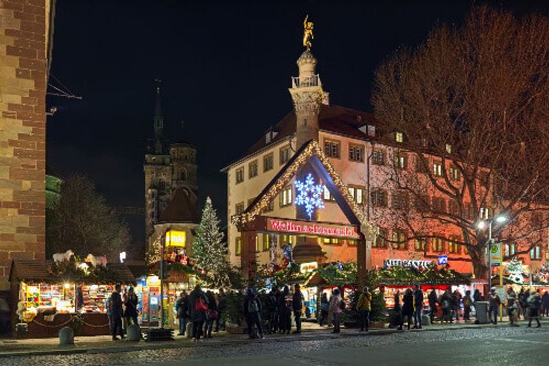 The entrance to the Christmas Market at the Schillerplatz Square, near the Collegiate Church and Old Castle.