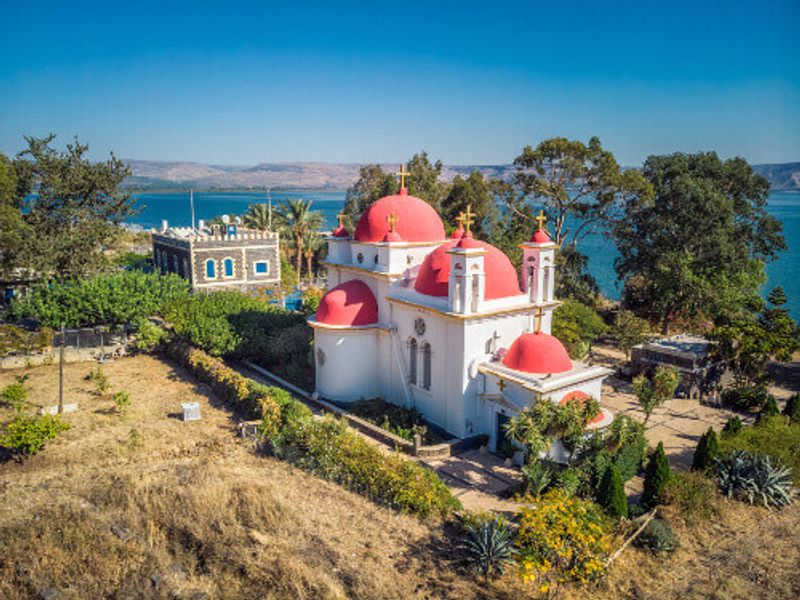 Capernaum Church shot with a drone from highest point in Tiberias, Israel.