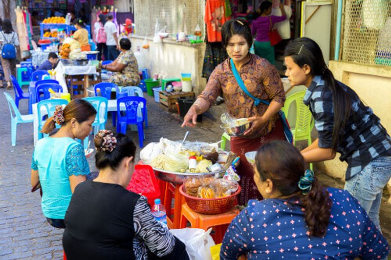 Street food in Bogyoke Aung San Market formerly Scotts Market, a major bazaar located in Pabedan.