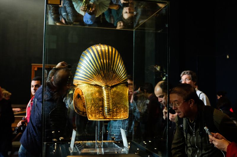 Tutankhamens Mask being photographed in a museum in Cairo