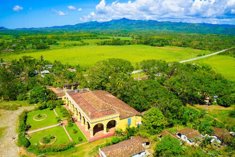 Valley de los Ingenios with abandoned sugar mills and dormitories, and a UNESCO site.