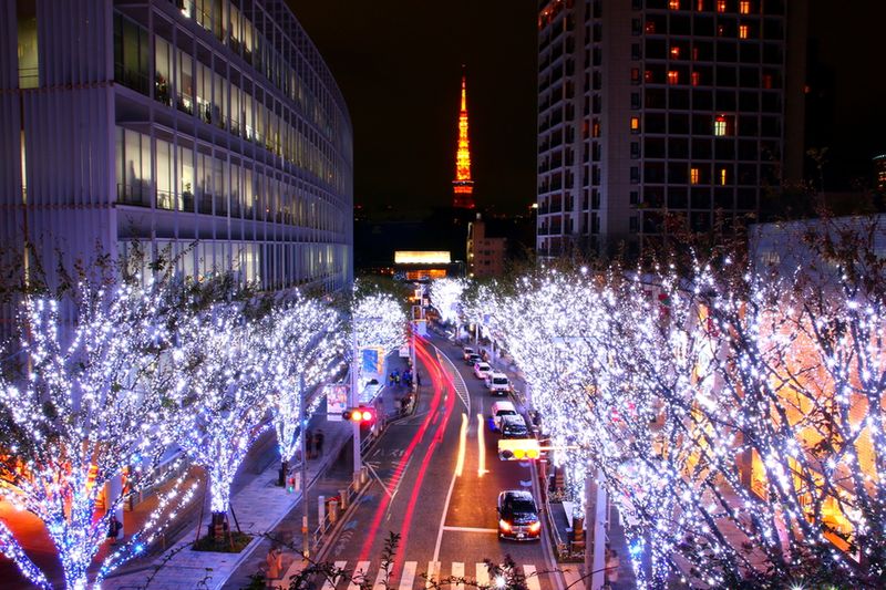 The Ropponggi Tokyo Tower and illuminated trees.
