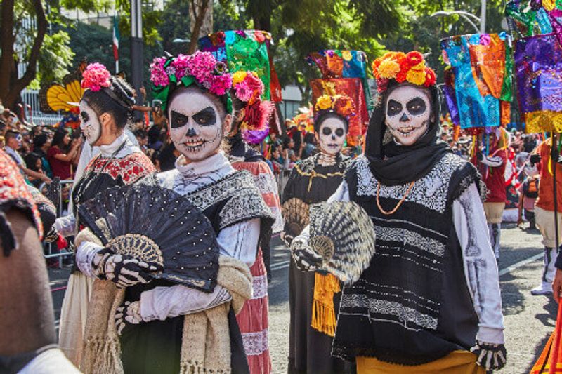 Girls with skeleton for make up on the Day of The Dead or Dia de Los Muertos.