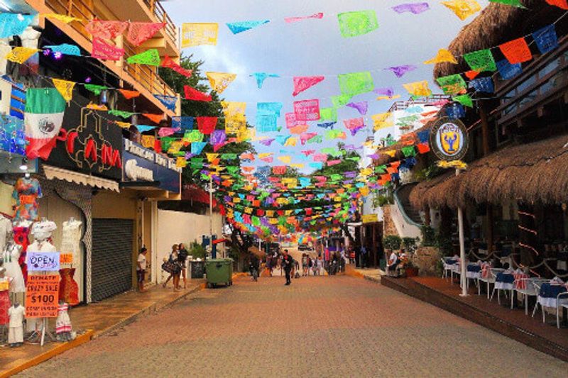 Papel picados in Fifth Avenue, at the centre of Playa del Carmen, Riviera Maya.