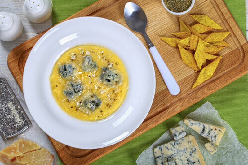 Hot delicious and creamy Gorgonzola Polenta in Switzerland.