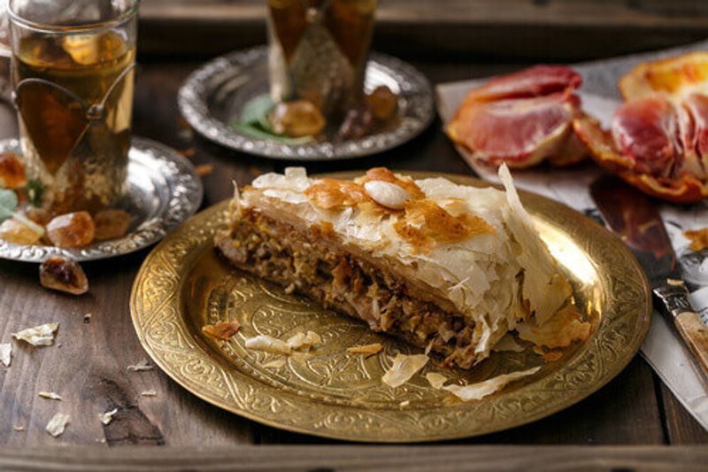 A slice of Makmoura, a Jordanian chicken dish.