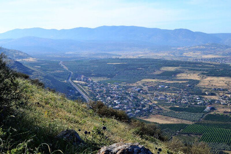 Hiking the Jesus trail with a view of Mt. Arbel in the countryside of Gailee.