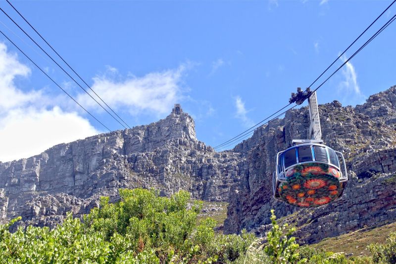 Cable cars often go up and down the picturesque Table Mountain.