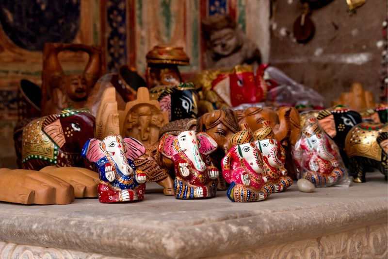Wooden Ganesha souvenirs in a stall in Mandawa.