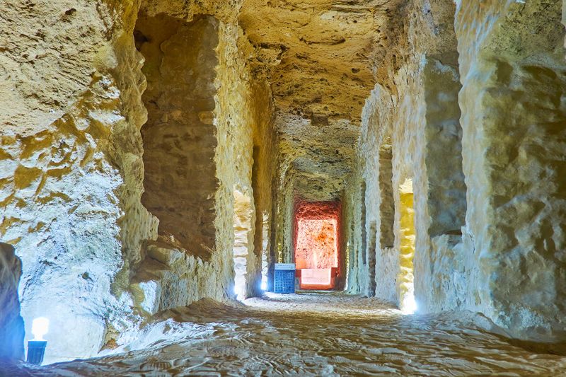 The stone halls of the catacombs of Serapeum Temple in Amoud al Sawari draws visitors year round.