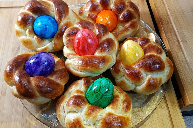 Braided brioche bread with coloured easter eggs