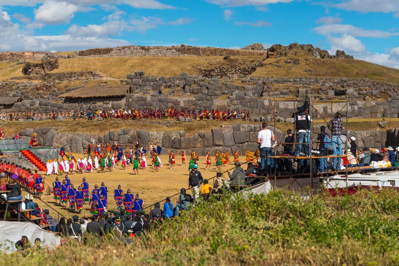 The filming of the main celebration of Inti Raymi at the Inca ruin of Sacsayhuaman.