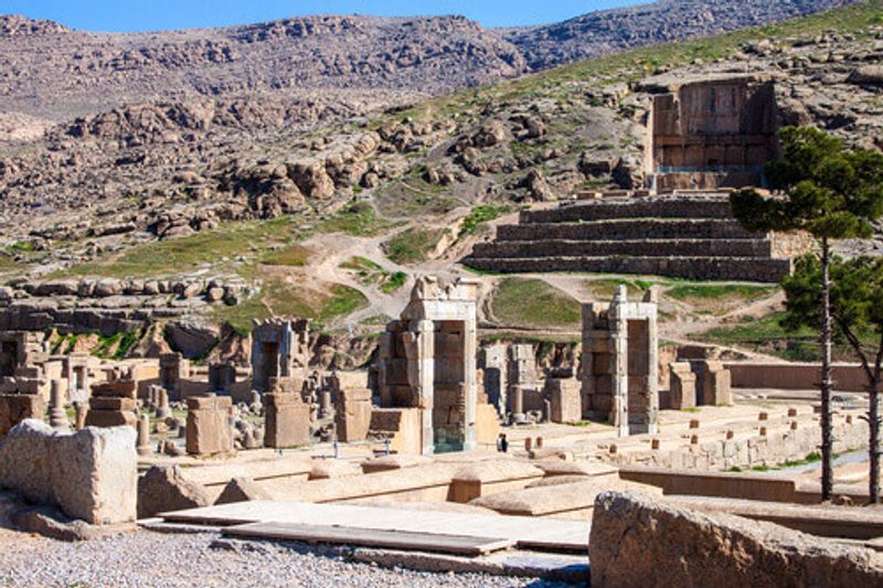 Palace of 100 columns and the Tomb of Artaxerxes II in the ruins of ancient Persepolis.