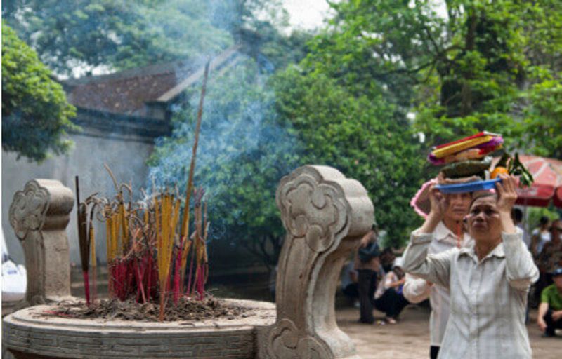 An incense offering at the Hung King's Festival, Vietnam.