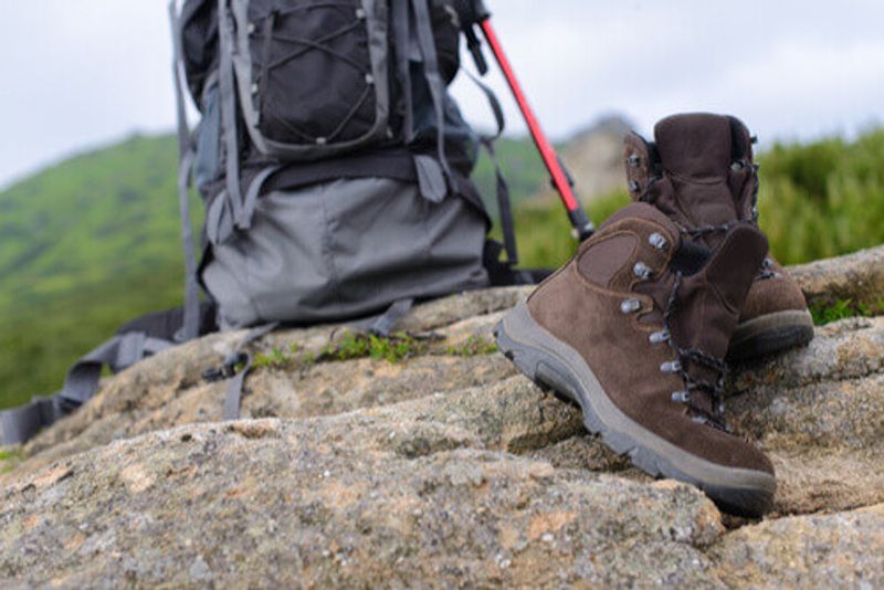Close-up of hiking boots and pack