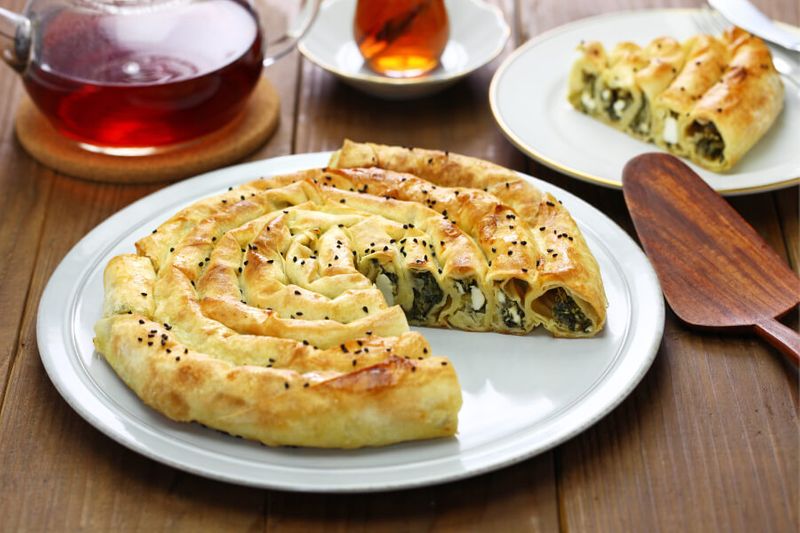 Nothing beats a homemade Turkish rolled dish called Borek, a cuisine made with spinach and feta cheese.