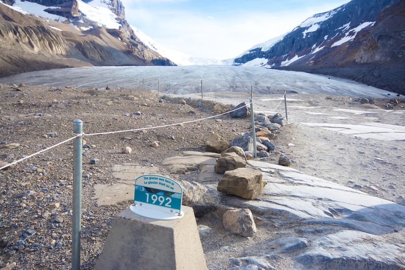 Date markers at the Athabasca Glacier indicate how much the glacier has receded over time.