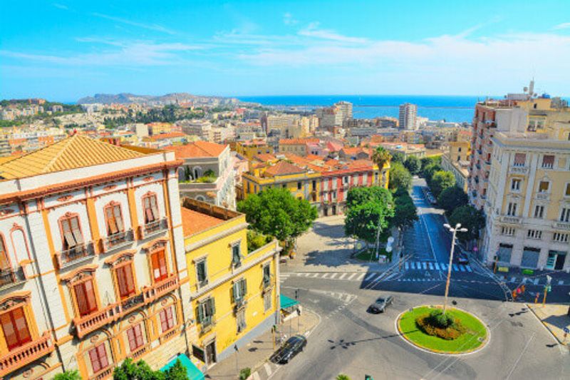 The Piazza Costituzione cityscape on a clear day.