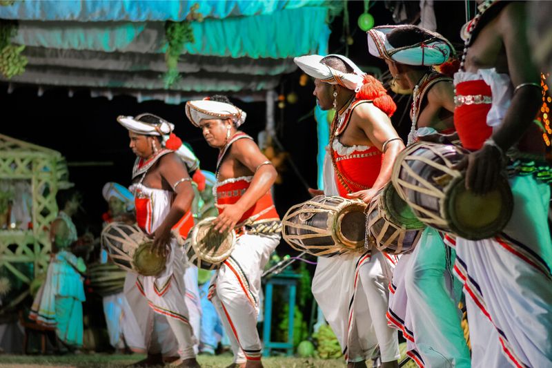 Men dancing for the Kohomba Kankariya dancing festival.