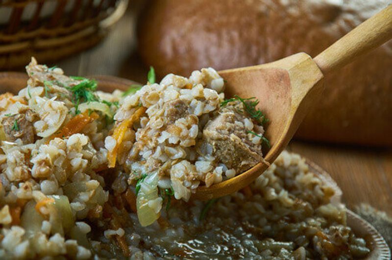 Kasha Po Kupecheski is a famous Russian buckwheat porridge  with vegetables and beef.