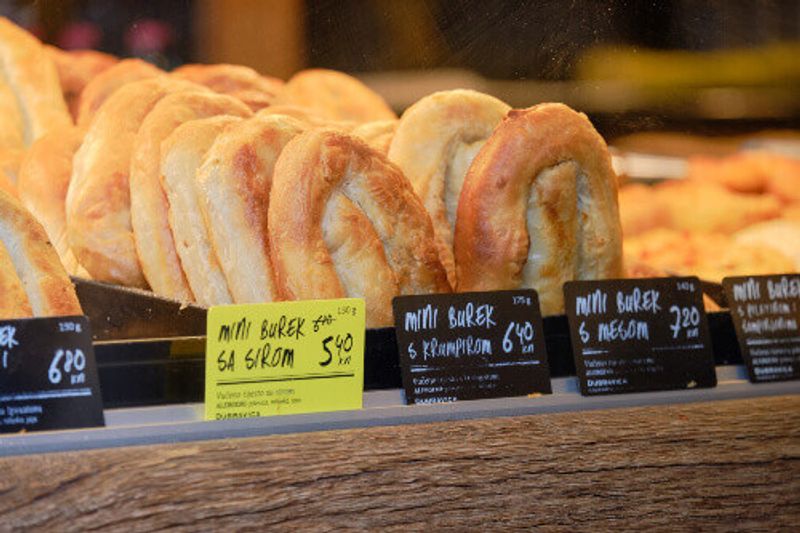 A display of mini burek, a local speciality at a bakery in Zagreb.