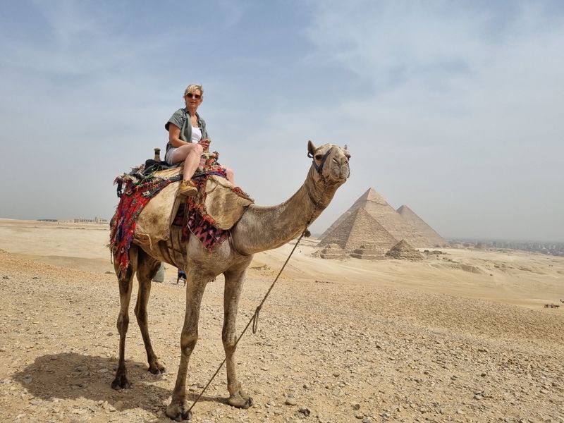 Riding a camel around the pyramids (Photo: Linda Davis)