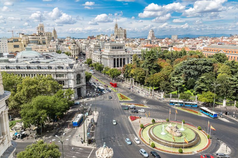 An aerial view of Cibeles fountains at Plaza de Cibeles on a beautiful summer morning.