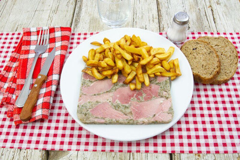 Jambon Persille is a french dish accompanied with bread and fries.