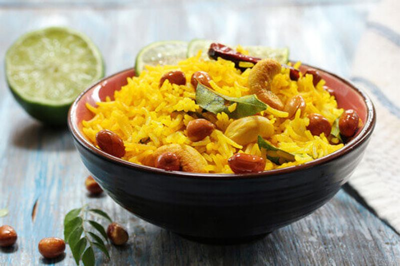 A delicious meal of lemon rice with basmati rice and nuts is common in the south of India.
